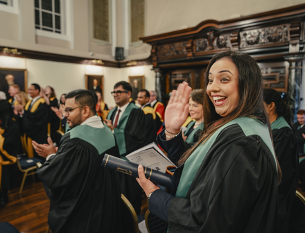 diplomats celebrating their diploma
